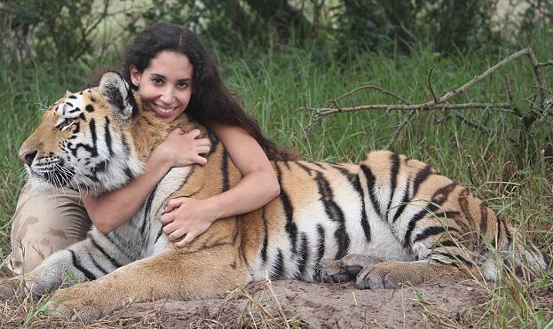 A Girl with a Syberian Tiger